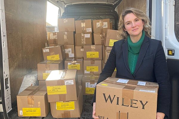 Jess Brown-Fuller helping at a foodbank