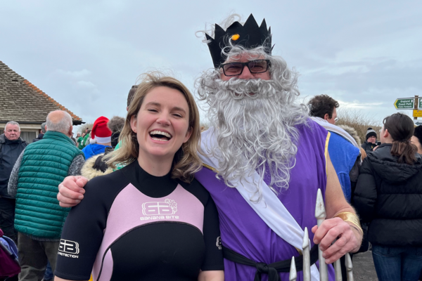 Jess Brown-Fuller and King Neptune prepare for the Big Dip at East Wittering Beach on New Year’s Day. Taken by Emma Mason