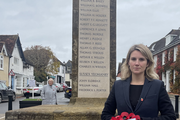 Jess Brown-Fuller laying a wreath at the Midhurst Cenotaph